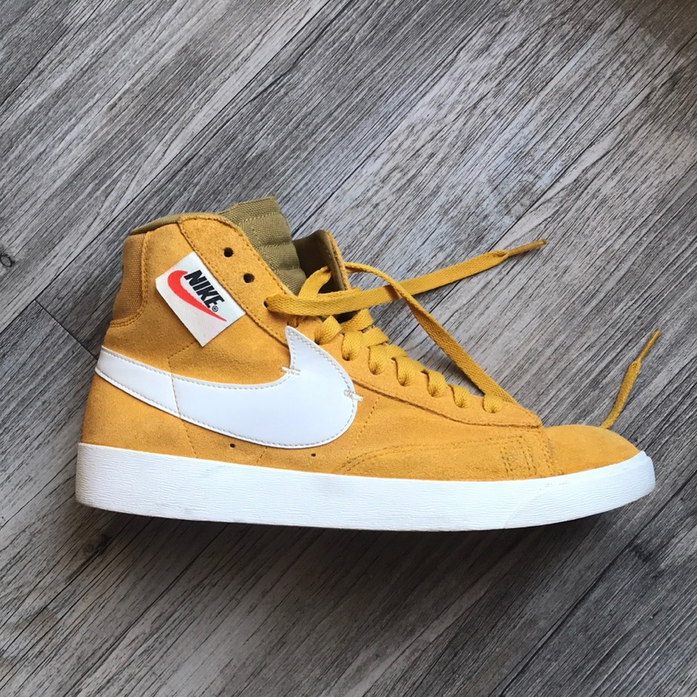 Yellow Nike Hightop Sneaker with a zipper side